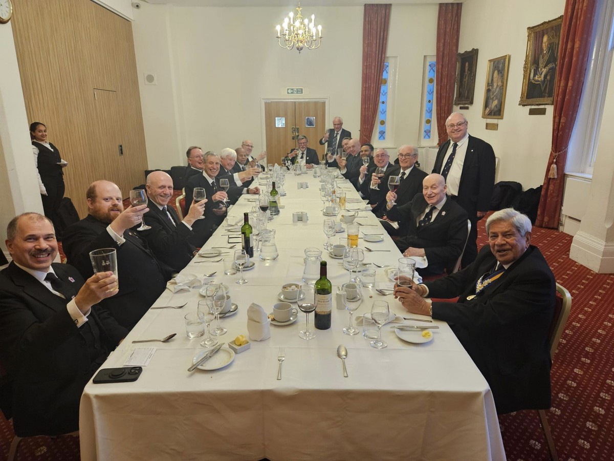 The Brethren raising a toast at the festive board